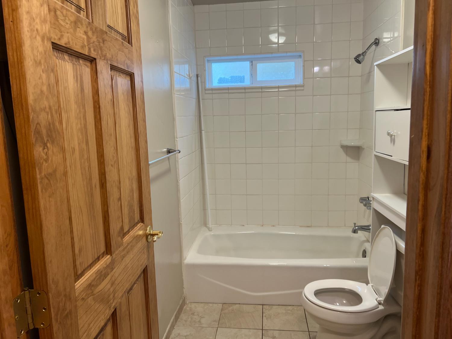 312 South Church Street Ione, CA 95640 - Photo 11 of 22 a bathroom with a bathtub a toilet and a shower
