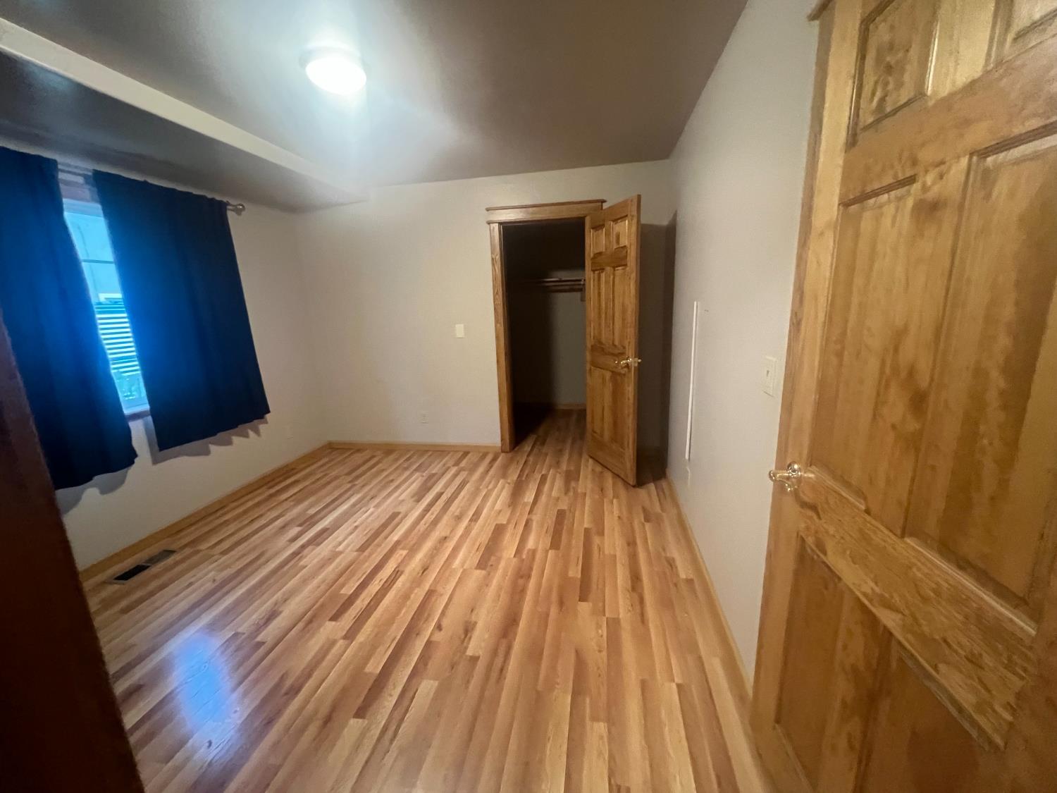 312 South Church Street Ione, CA 95640 - Photo 15 of 22 a view of a room with wooden floor and stairs