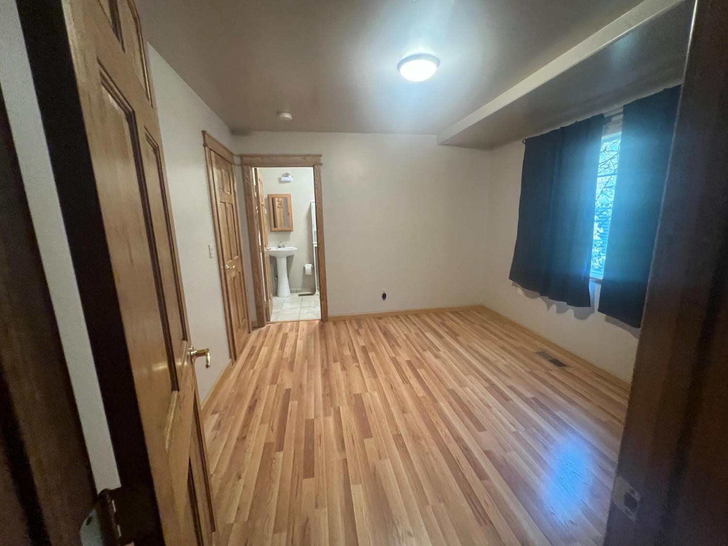 312 South Church Street Ione, CA 95640 - Photo 22 of 22 a view of empty room with wooden floor