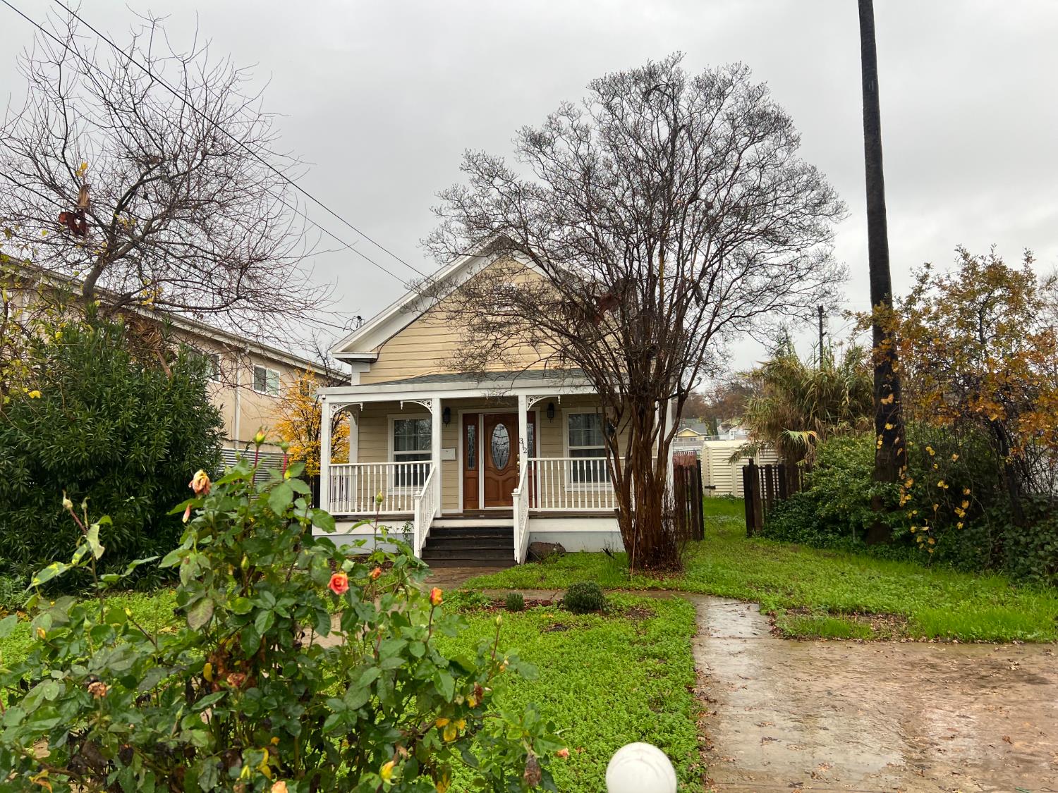312 South Church Street Ione, CA 95640 - Photo 3 of 22 a front view of house with yard and green space