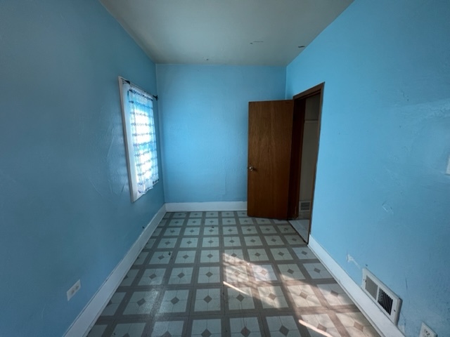 305 153rd Street Calumet City, IL 60409 - Photo 21 of 40 a view of empty room with windows