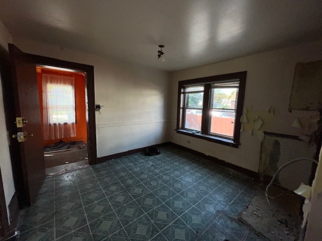305 153rd Street Calumet City, IL 60409 - Photo 25 of 40 an empty room with windows