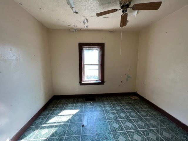 305 153rd Street Calumet City, IL 60409 - Photo 27 of 40 an empty room with a empty space and windows