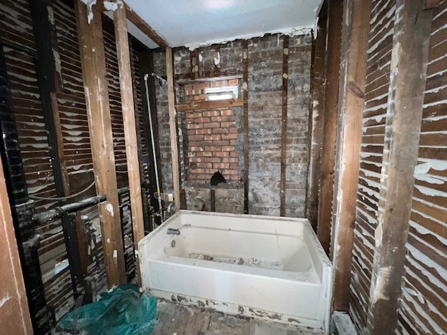 305 153rd Street Calumet City, IL 60409 - Photo 30 of 40 a bathroom with bathtub and shower