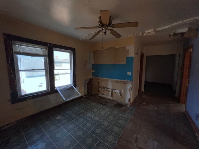 305 153rd Street Calumet City, IL 60409 - Photo 31 of 40 an empty room with windows and fan