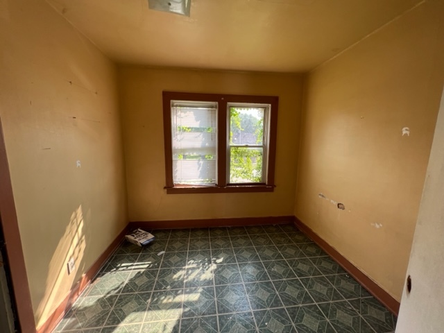 305 153rd Street Calumet City, IL 60409 - Photo 33 of 40 wooden floor in an empty room with a window