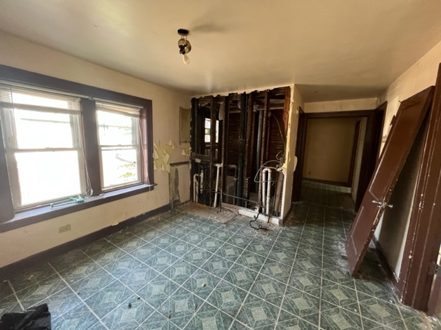 305 153rd Street Calumet City, IL 60409 - Photo 5 of 40 a view of a room with gym equipment