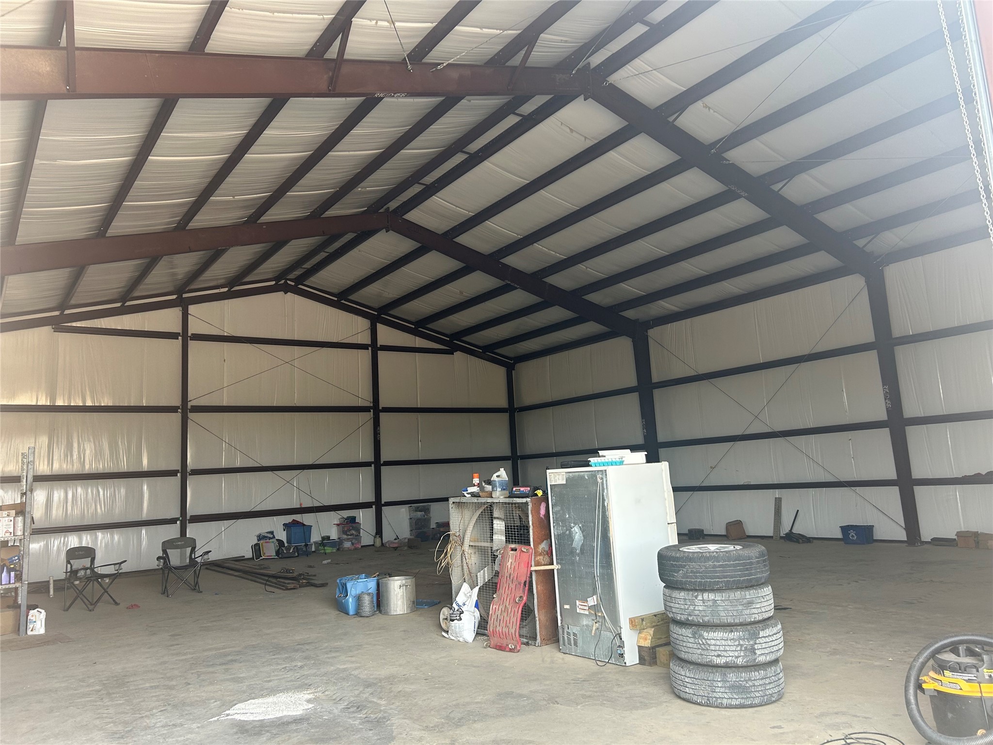 18074 Hill Road Cleveland, TX 77328 - Photo 7 of 19 a view of storage and utility room