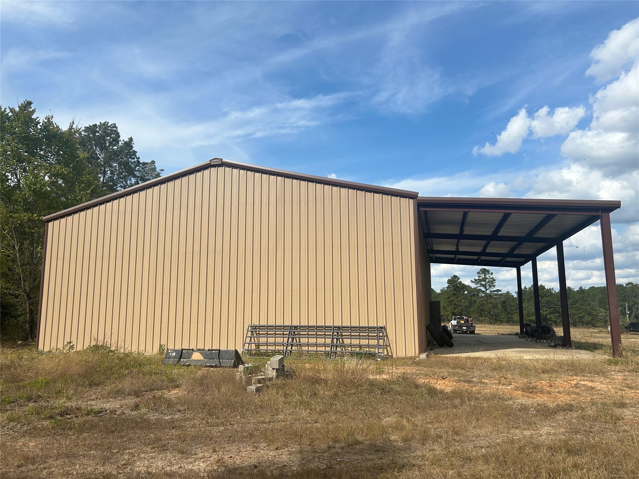 18074 Hill Road Cleveland, TX 77328 - Photo 9 of 19 a view of a backyard