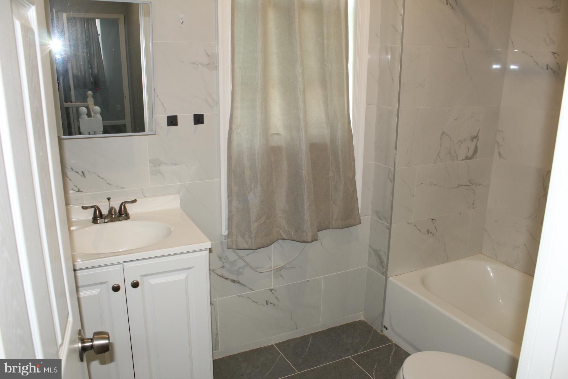 2546 West Seltzer Street Philadelphia, PA 19132 - Photo 15 of 17 bathroom 2
