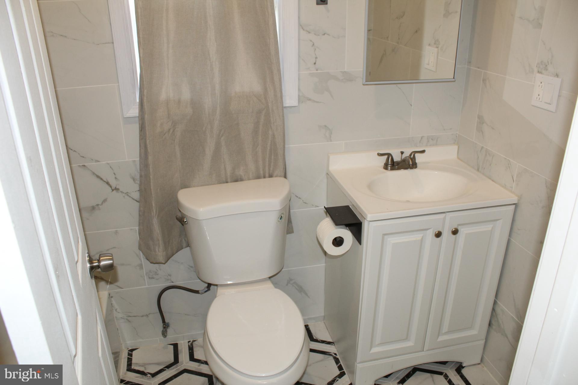 2546 West Seltzer Street Philadelphia, PA 19132 - Photo 10 of 17 bathroom 1
