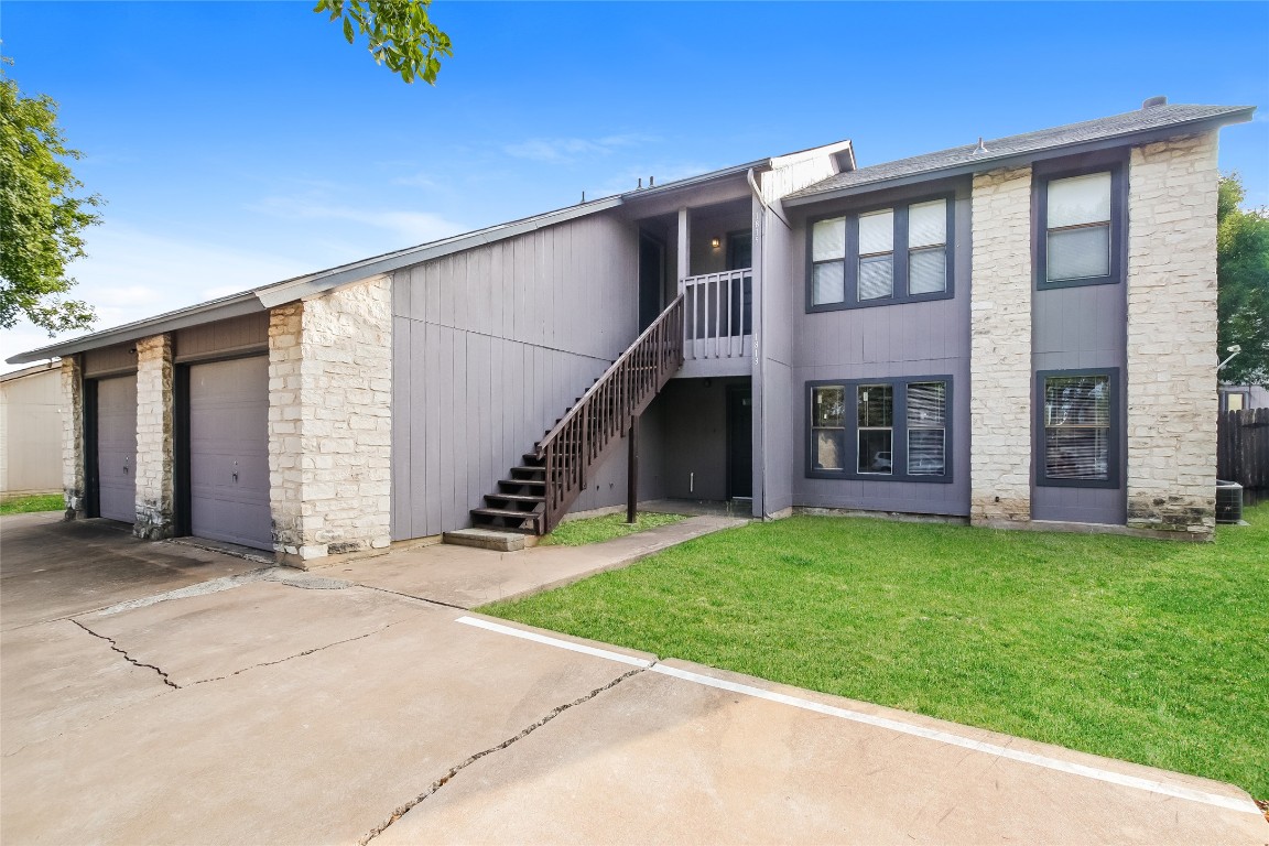 1813 Rawhide Drive Round Rock, TX 78681 - Photo 3 of 16 a backyard of a house with table and chairs