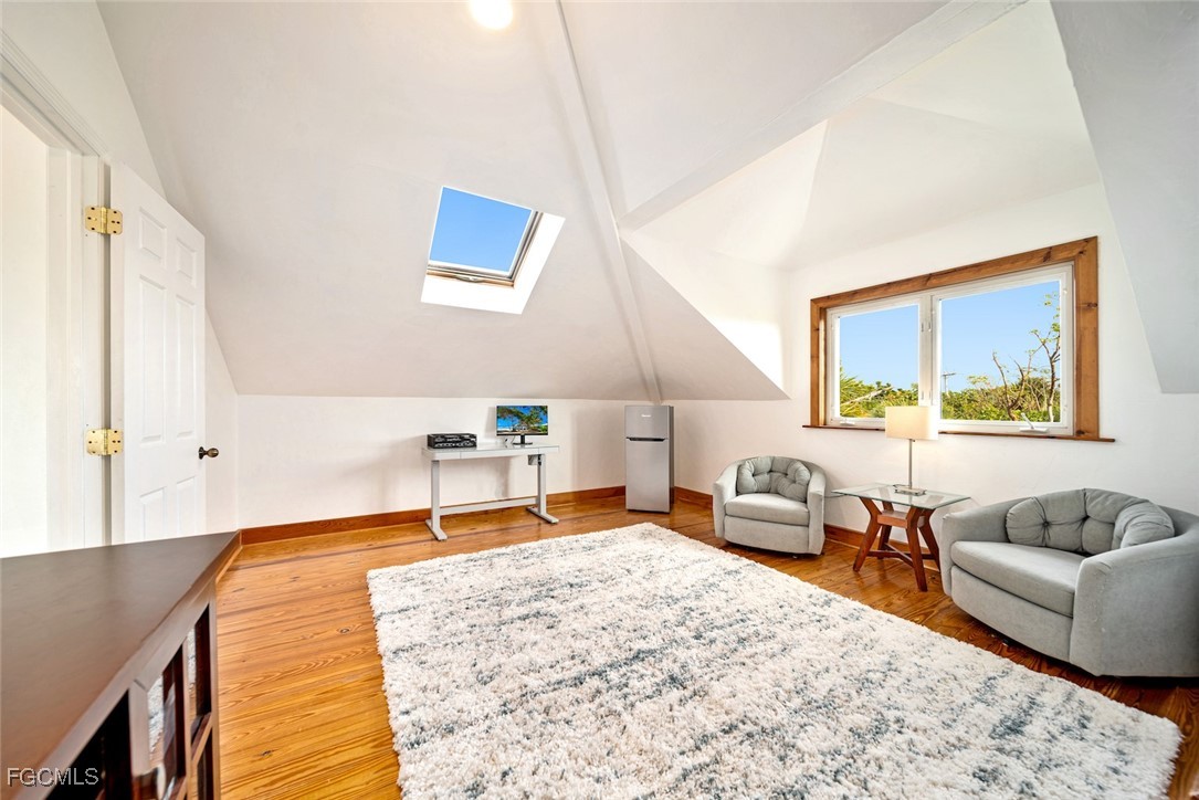 4546 Buck Key Road Sanibel, FL 33957 - Photo 26 of 41 a bedroom with furniture and a couch