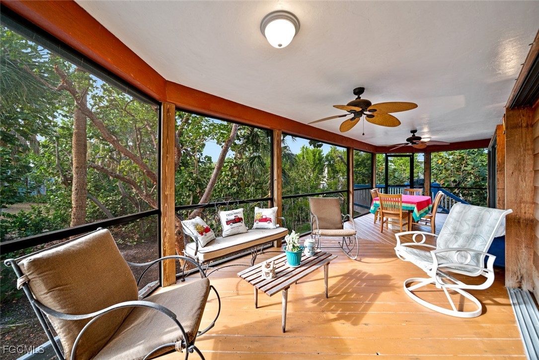 4546 Buck Key Road Sanibel, FL 33957 - Photo 30 of 41 a outdoor space with furniture and garden view