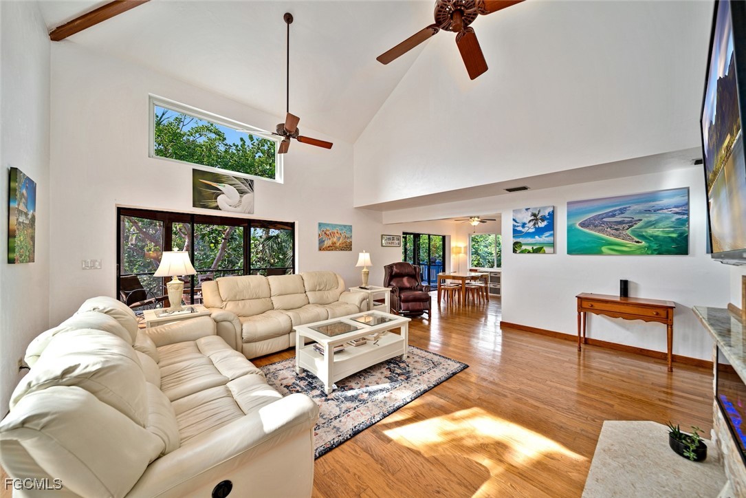 4546 Buck Key Road Sanibel, FL 33957 - Photo 7 of 41 a living room with furniture and a window