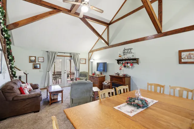 a bedroom with a bed and a table