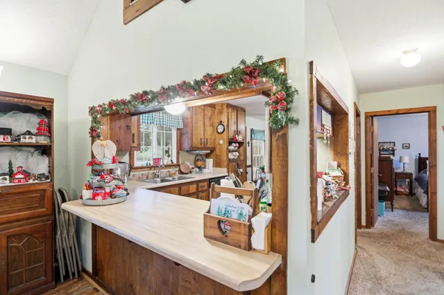 a bathroom with double vanity sink and a mirror