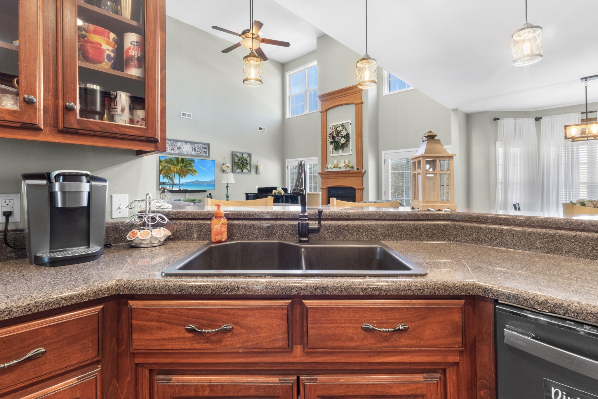 4591 Pineywoods Road Adams, TN 37010 - Photo 19 of 83 a kitchen with granite countertop a sink and a wooden floor