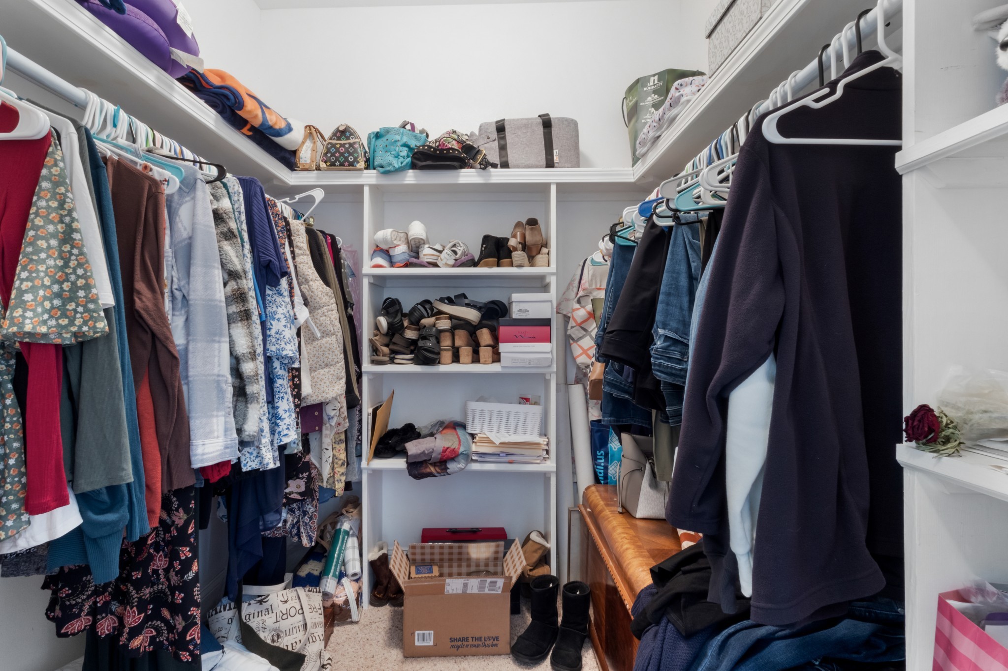 4591 Pineywoods Road Adams, TN 37010 - Photo 29 of 83 a view of walk in closet with clothes and shoes