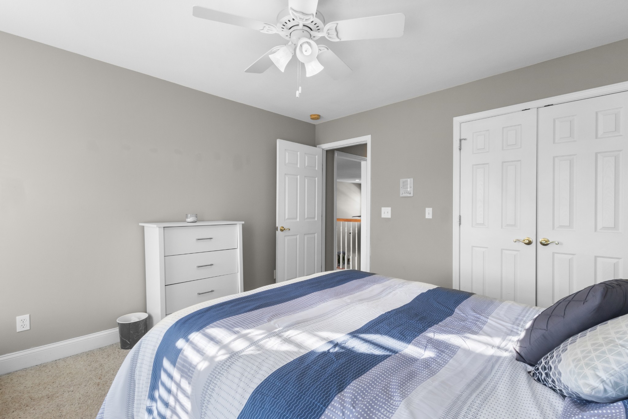 4591 Pineywoods Road Adams, TN 37010 - Photo 33 of 83 a bedroom with a bed and a chandelier