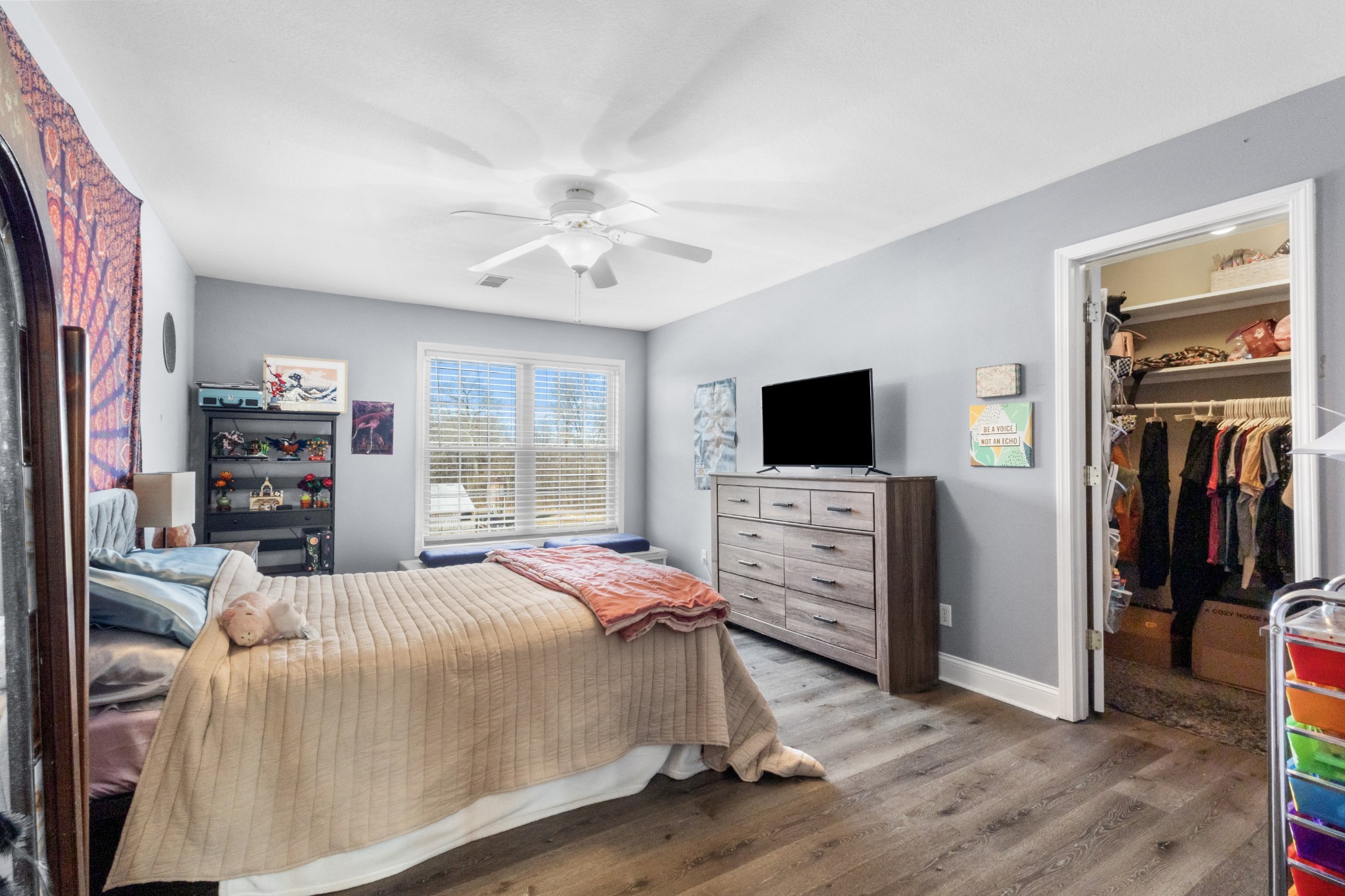 4591 Pineywoods Road Adams, TN 37010 - Photo 34 of 83 a bedroom with a bed and a flat screen tv