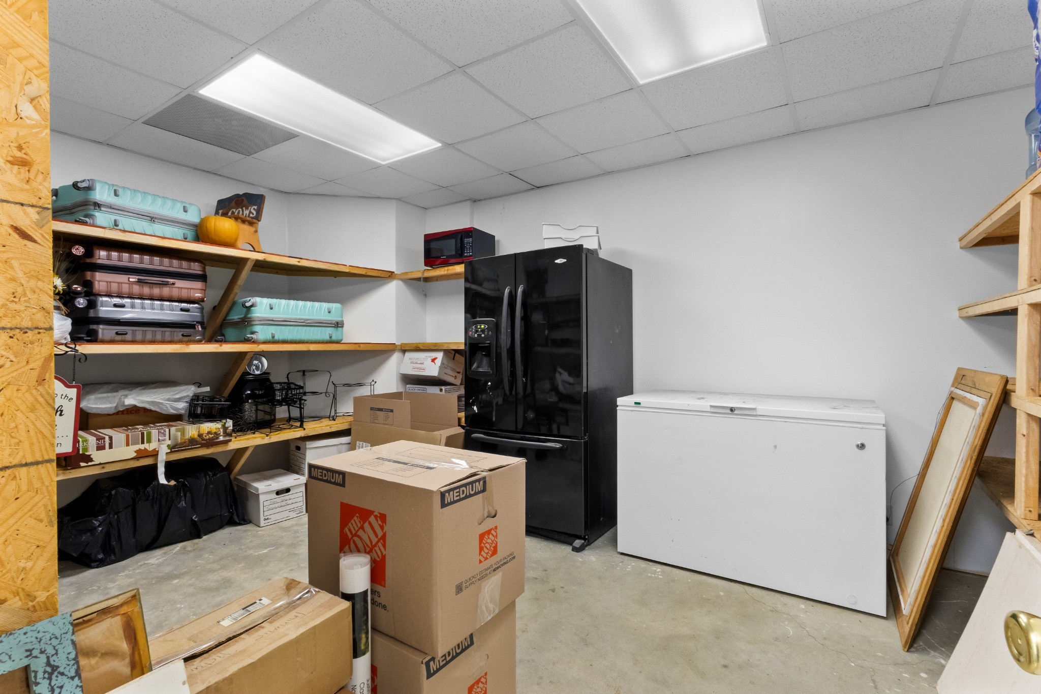 4591 Pineywoods Road Adams, TN 37010 - Photo 46 of 83 a kitchen with a stove and a refrigerator