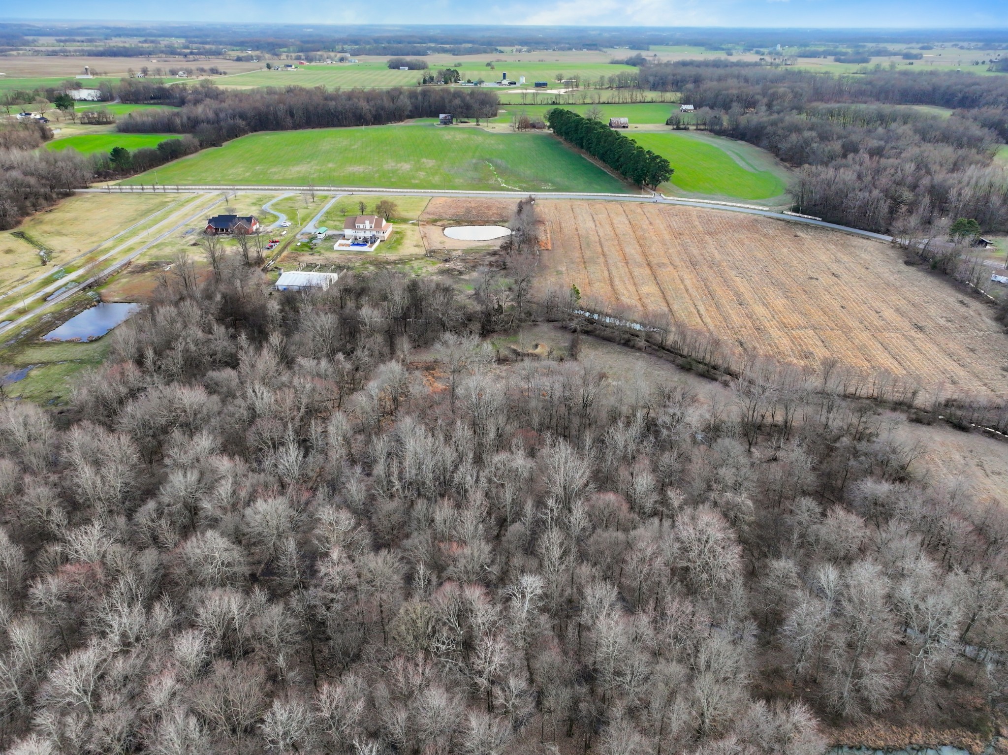 4591 Pineywoods Road Adams, TN 37010 - Photo 79 of 83 an aerial view of a house with a yard