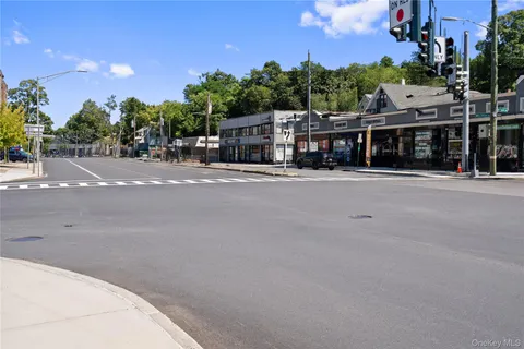 a view of a city street from a building