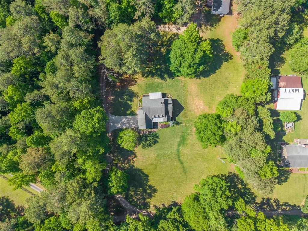 5822 John Burruss Road Cumming, GA 30040 - Photo 56 of 65 an aerial view of a house with a yard