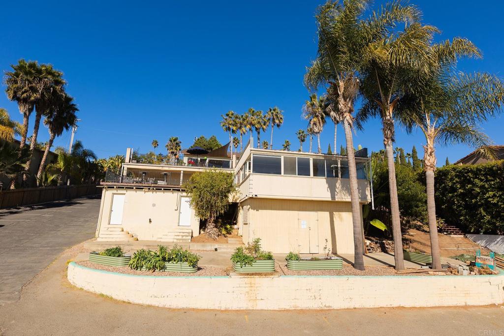 4509 Adams Street Carlsbad, CA 92008 - Photo 16 of 18 a front view of a house with a yard