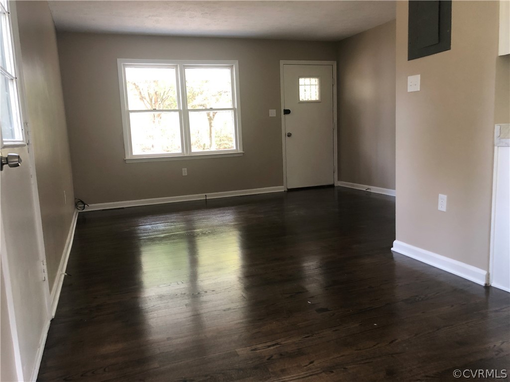 1813 Little Deer Road Alberta, VA 23821 - Photo 18 of 27 an empty room with wooden floor and windows