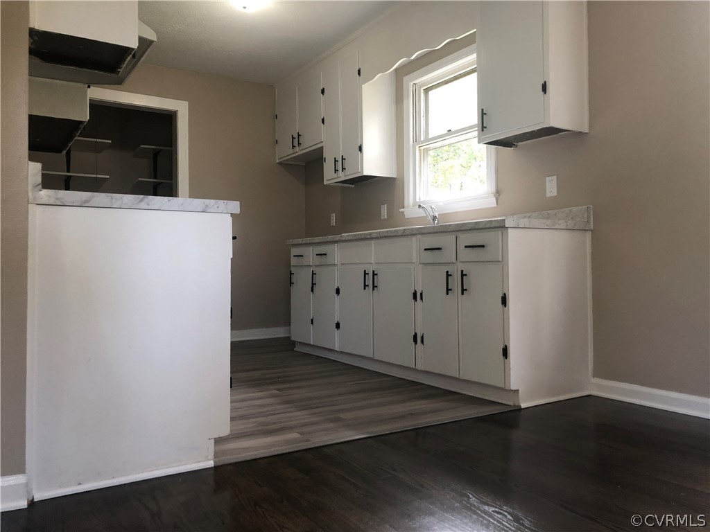 1813 Little Deer Road Alberta, VA 23821 - Photo 19 of 27 a kitchen with granite countertop cabinets appliances and a window
