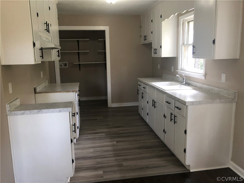 1813 Little Deer Road Alberta, VA 23821 - Photo 20 of 27 a kitchen with granite countertop a sink stove and refrigerator