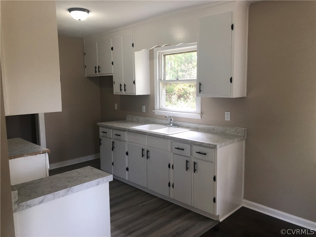 1813 Little Deer Road Alberta, VA 23821 - Photo 6 of 27 a kitchen with cabinets appliances a sink and a window