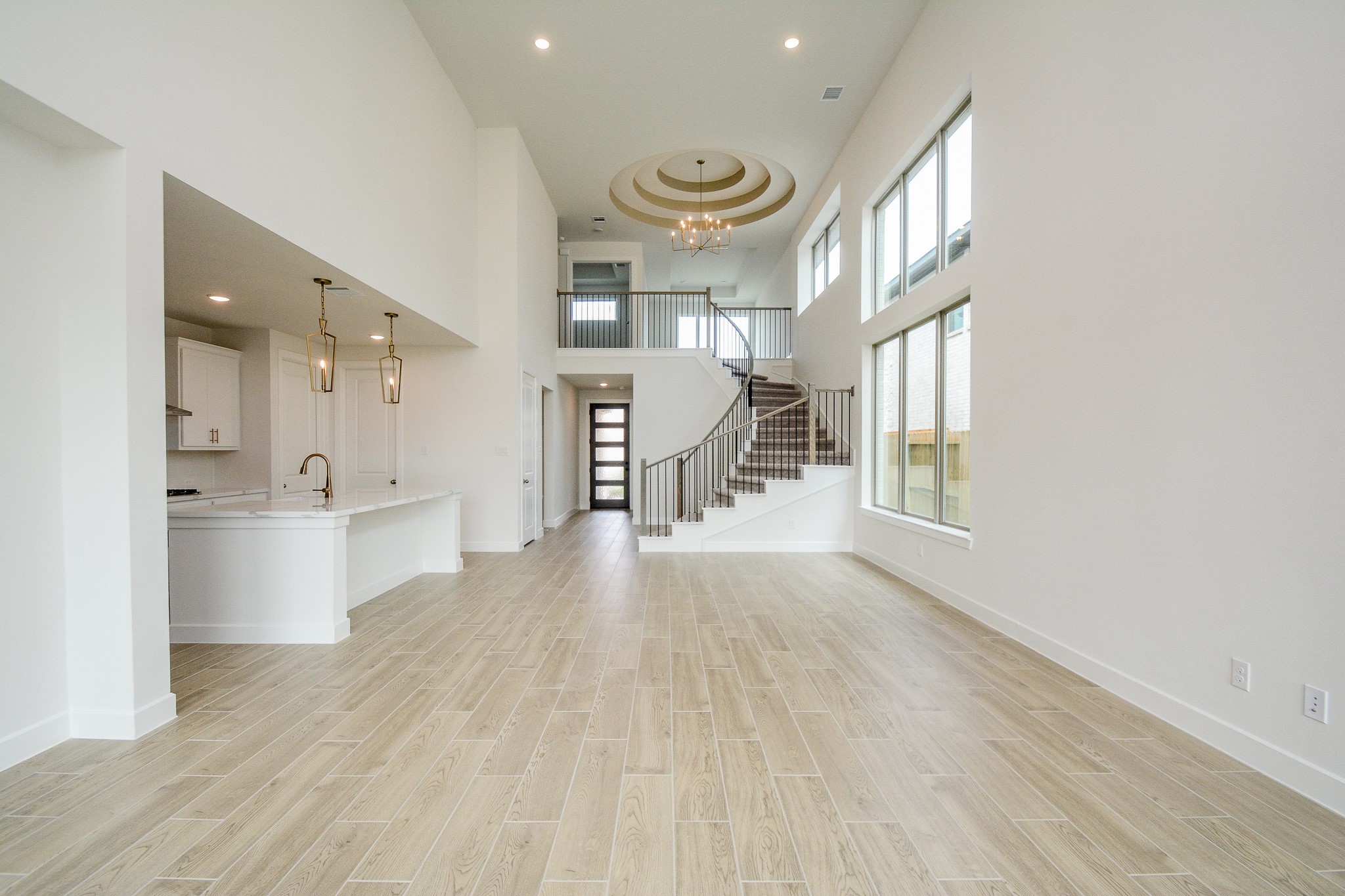 4407 Ruby Gdn Court Fulshear, TX 77441 - Photo 4 of 32 Open-concept living space with soaring ceilings