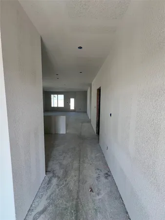a view of entryway and hall with a window