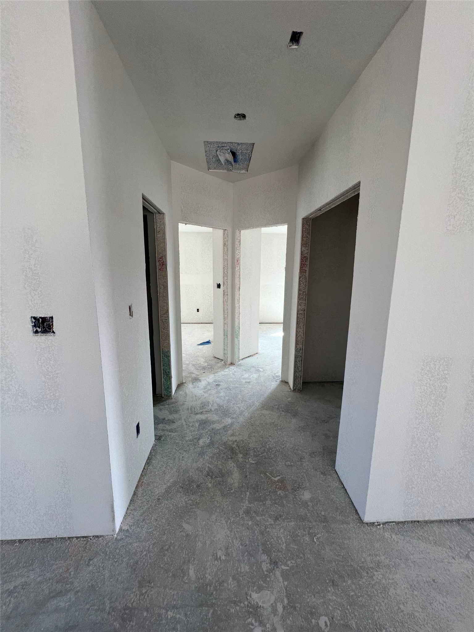 216 Gus Loop Georgetown, TX 78626 - Photo 5 of 16 an empty room with a door