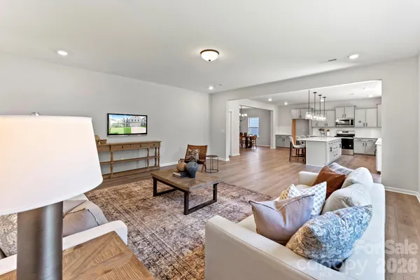 a living room with furniture and a table
