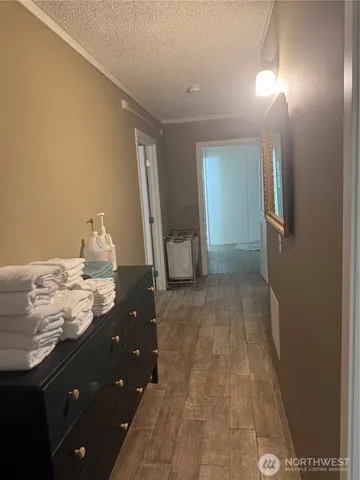 a white toilet sitting next to a white sink