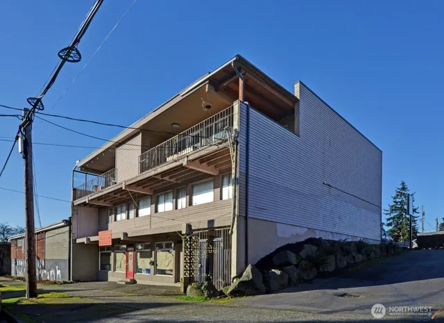 a front view of building with yard