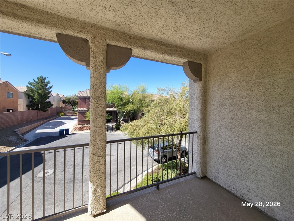 9843 West Overlook Ridge Avenue Las Vegas, NV 89148 - Photo 19 of 19 Experience neighborhood views from this private, covered balcony.