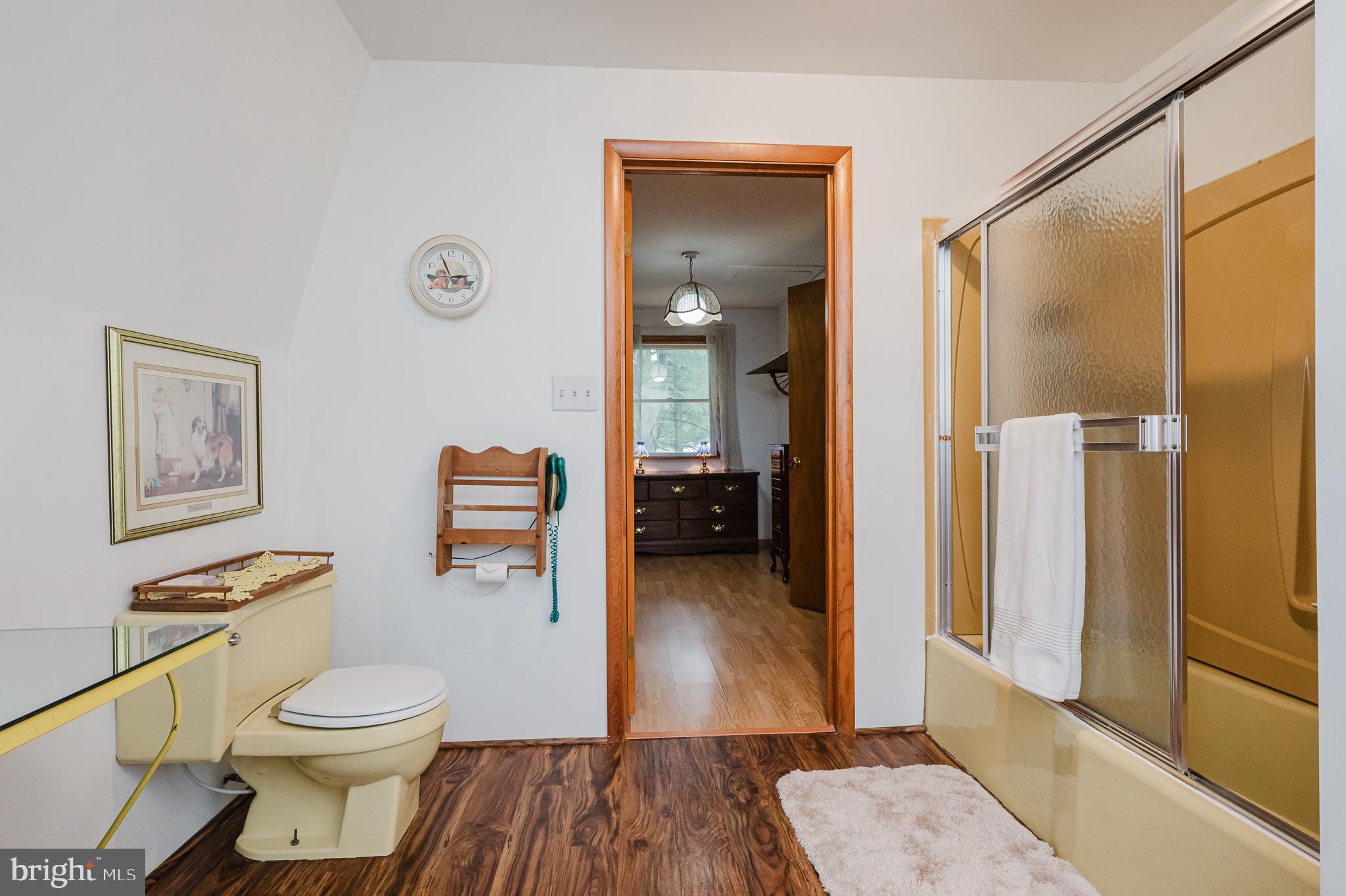 710 Magnolia Road Joppa, MD 21085 - Photo 31 of 58 a bathroom with a toilet and a shower