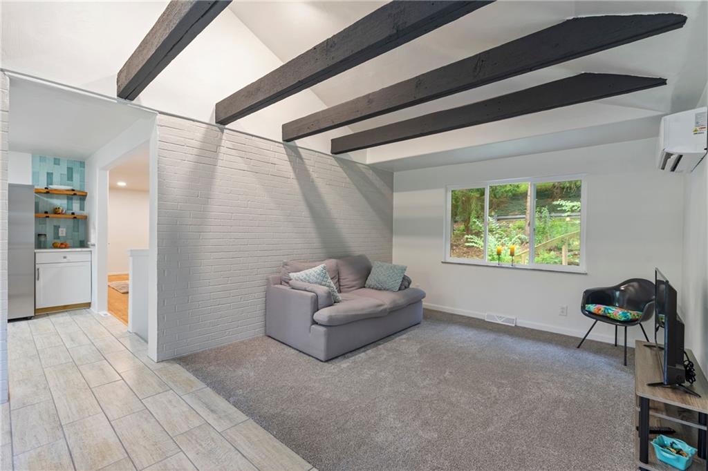 3326 New England Road West Mifflin, PA 15122 - Photo 17 of 46 a living room with furniture and a window