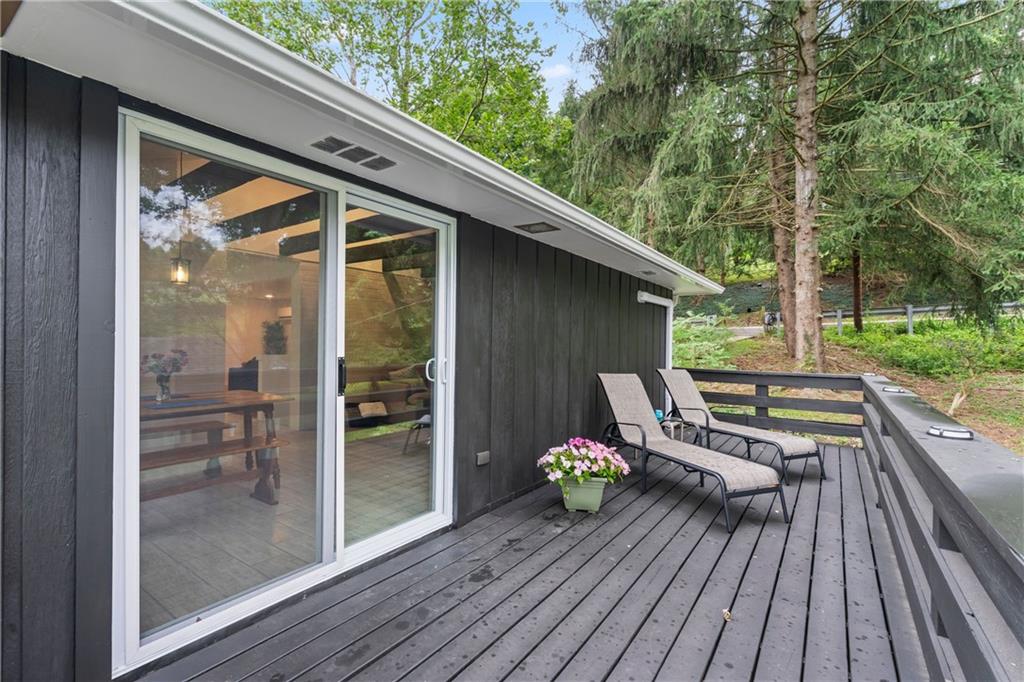 3326 New England Road West Mifflin, PA 15122 - Photo 5 of 46 a view of two chairs in the balcony with wooden floor