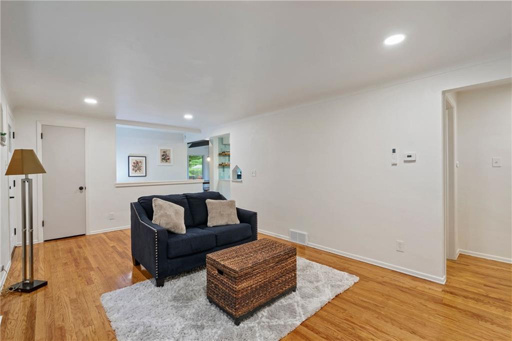 3326 New England Road West Mifflin, PA 15122 - Photo 8 of 46 a living room with furniture and a wooden floor