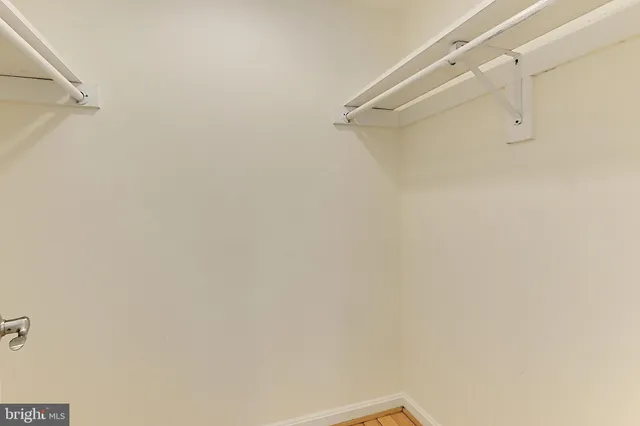 a view of small space with racks on the wall