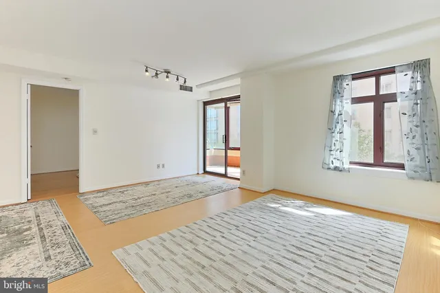 a view of an empty room and window