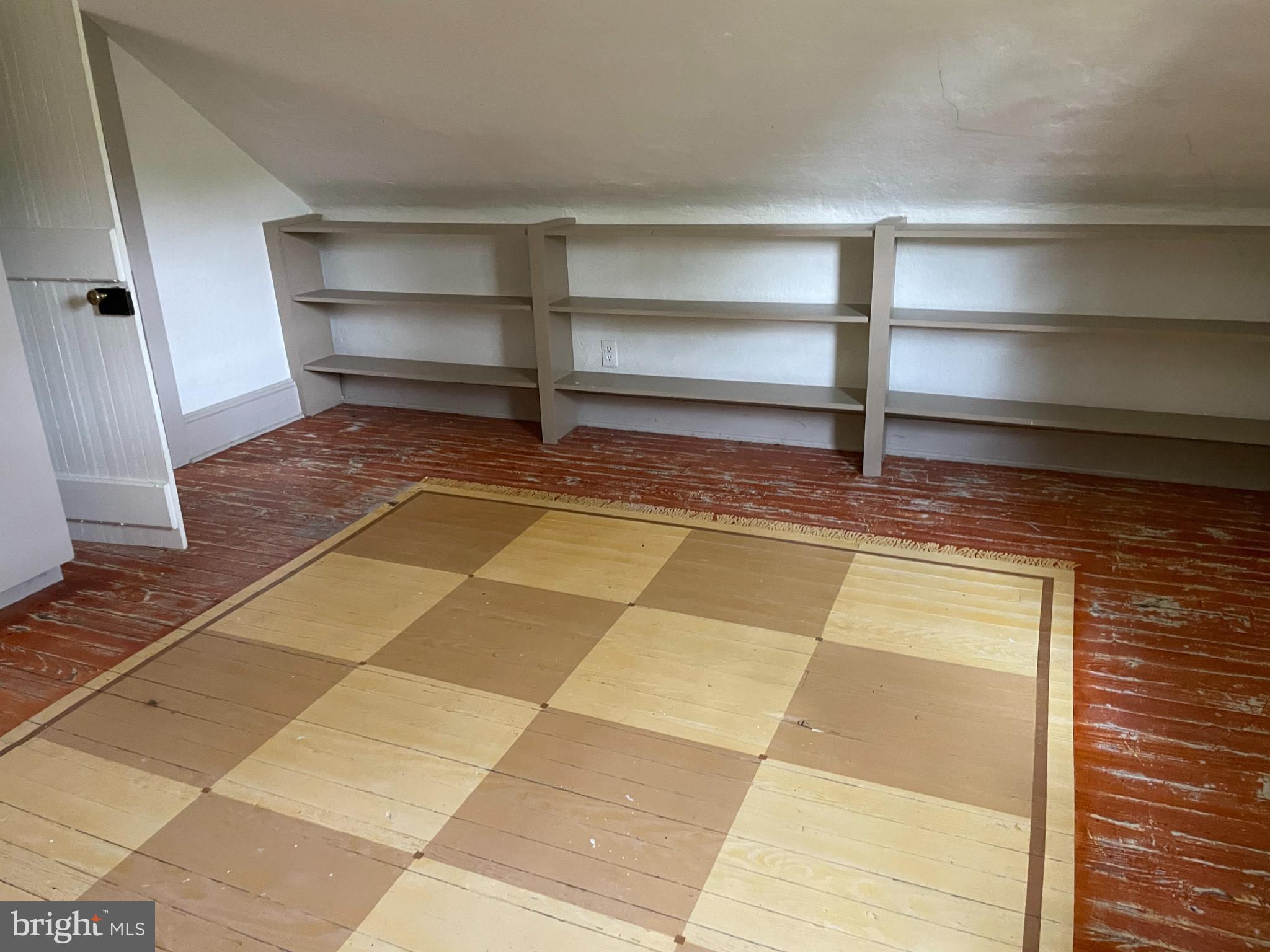 21909 Foxcroft Road Middleburg, VA 20117 - Photo 7 of 11 Nice bookcase and closet, painted floor