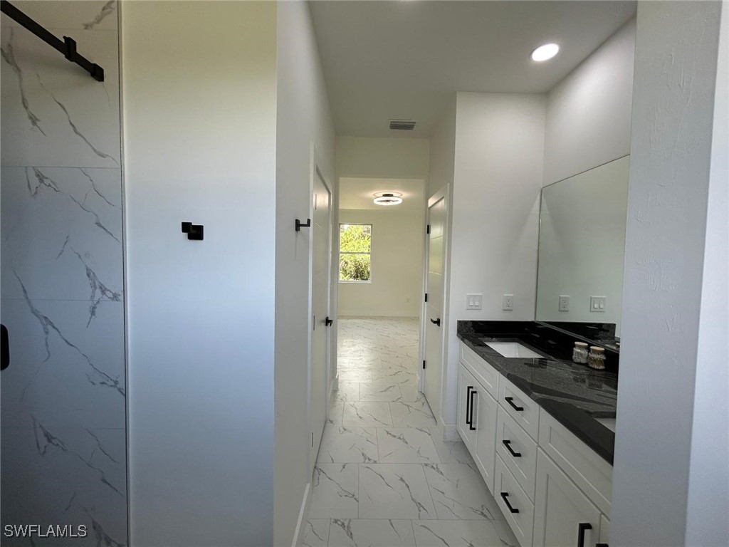4204 East 24th Street Alva, FL 33920 - Photo 22 of 34 a view of a kitchen counter space and stove top oven