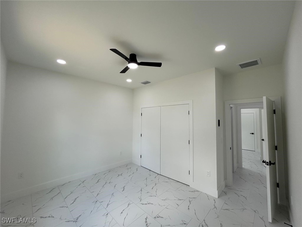 4204 East 24th Street Alva, FL 33920 - Photo 27 of 34 an empty room with ceiling fan and shower